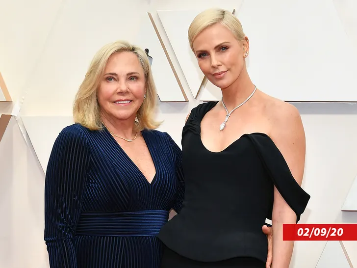 Charlize Theron with her mother, Gerda, at a red carpet event.