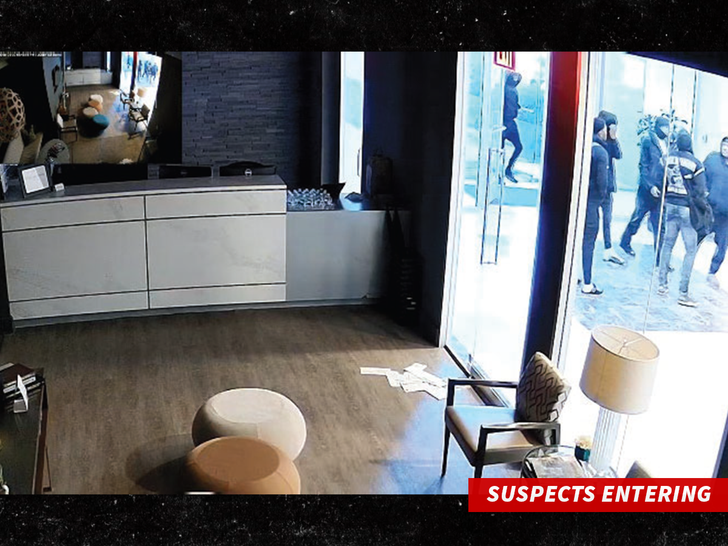 Surveillance image from the U.S. District Court shows a group entering a Dallas recording studio tied to the alleged incident