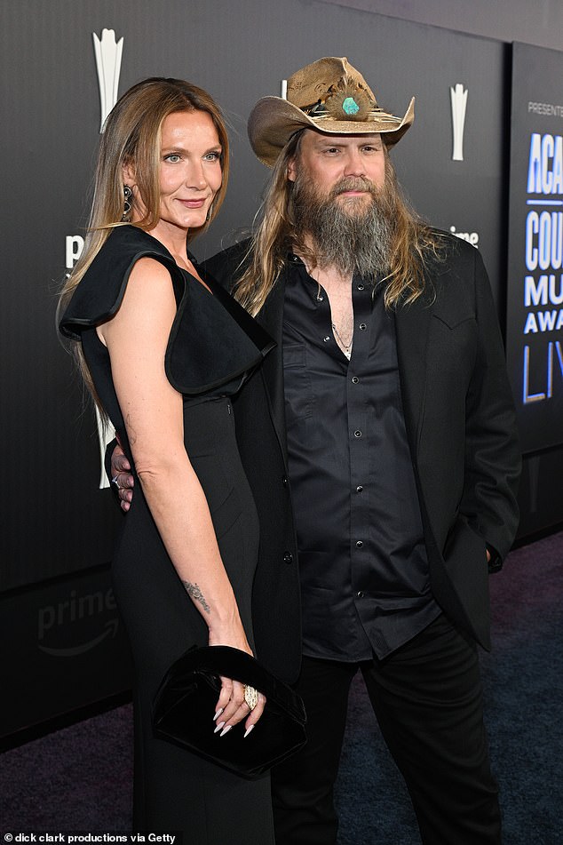 Chris Stapleton and wife Morgane coordinate in sleek black ensembles on the ACM red carpet