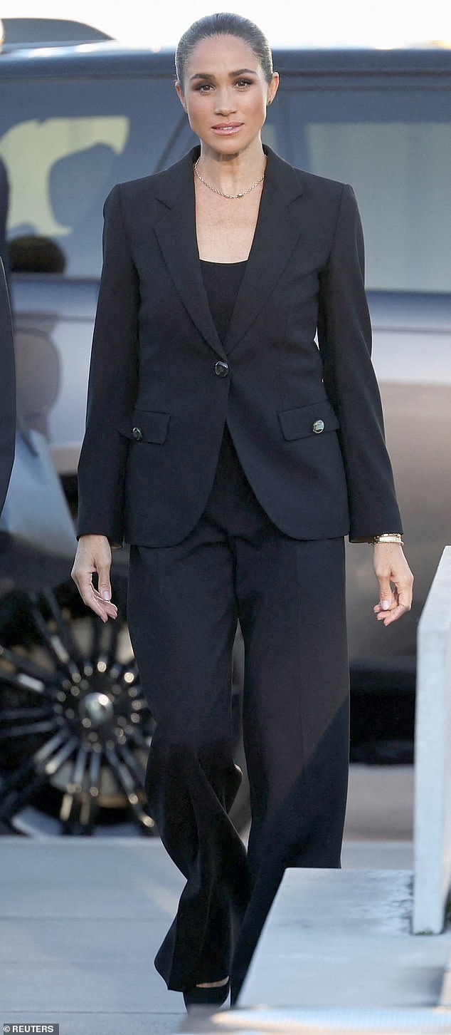 Meghan Markle in an all-black look in Geneva, wearing a jacket similar to the one visible in her wardrobe selfie.