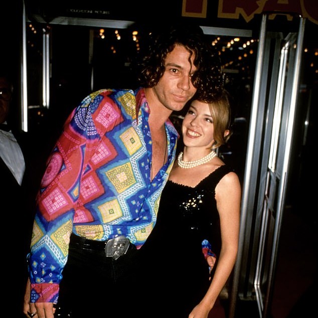 The showbiz world was stunned when, in 1989, squeaky clean Kylie embarked on a relationship with Hutchence - Daily Mail US