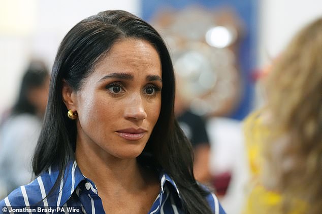 Meghan Markle during a recent visit to Australia; she later made a quiet solo trip to Chicago for her godson's First Communion.
