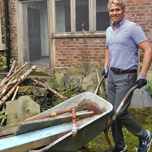 Mr DePree pictured with a wheelbarrow during early restoration work in 2017 - Daily Mail US