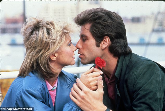 Travolta and Newton-John in the 1983 film Two of a Kind.