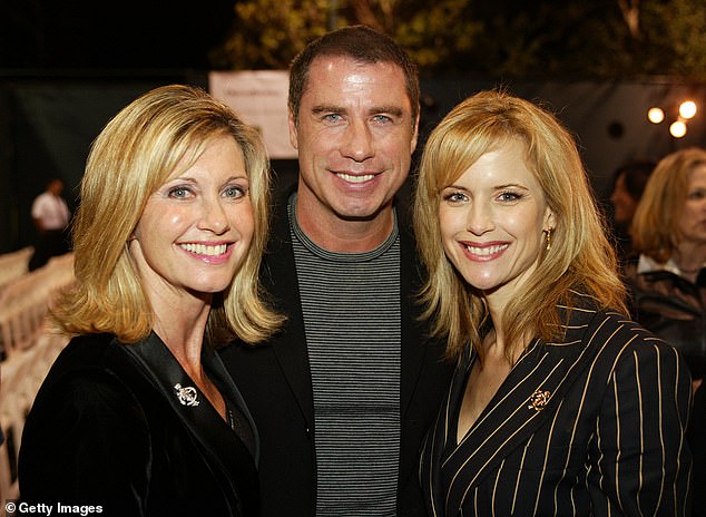 Olivia Newton-John with John Travolta and his wife Kelly Preston in Beverly Hills, October 2002.