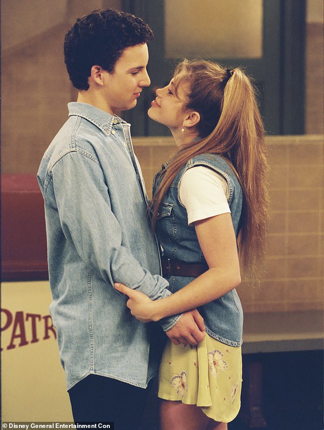 Danielle Fishel as Topanga Lawrence with Ben Savage as Cory Matthews in a 1990s Boy Meets World promo still.