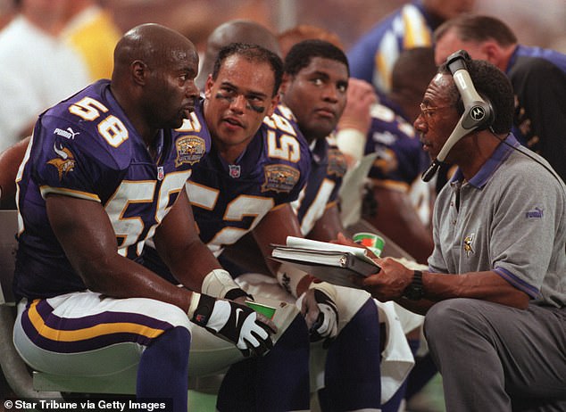 Minnesota Vikings offensive coordinator Sherman Lewis addresses players on the sideline