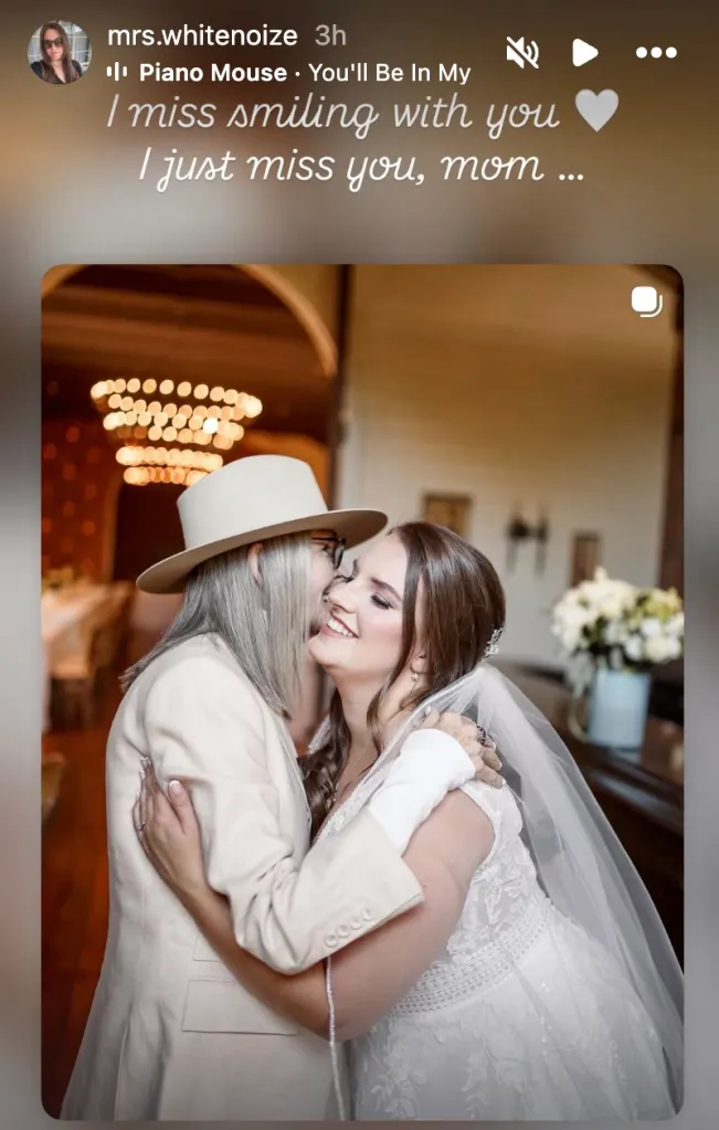 Diane Keaton embraces her daughter Dexter Keaton White on Dexter's 2021 wedding day.