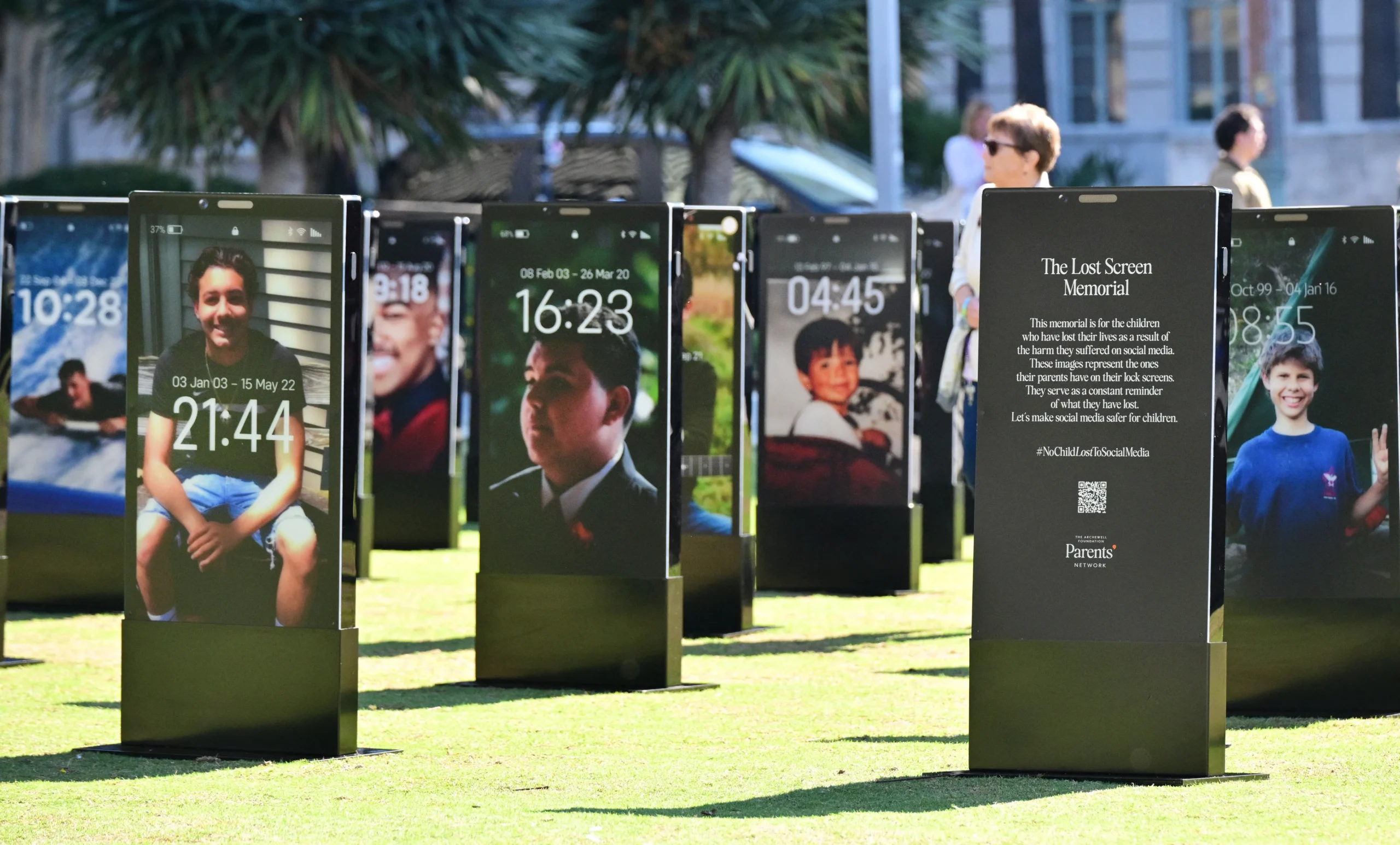 The Lost Screen Memorial installation of illuminated smartphone displays honoring children lost to online harms in Geneva.