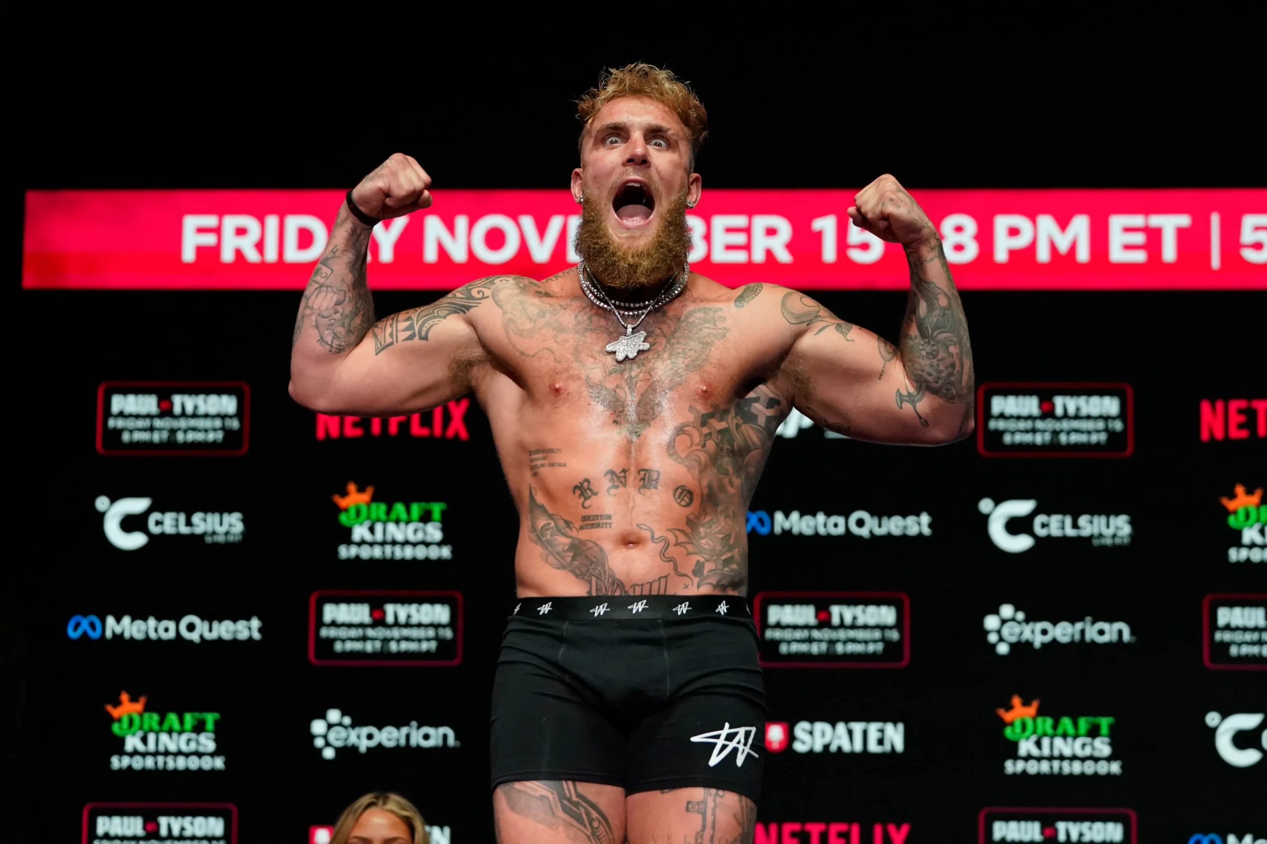 Jake Paul gestures during a weigh-in ahead of his Mike Tyson bout in Irving, Texas, Nov. 14, 2024.