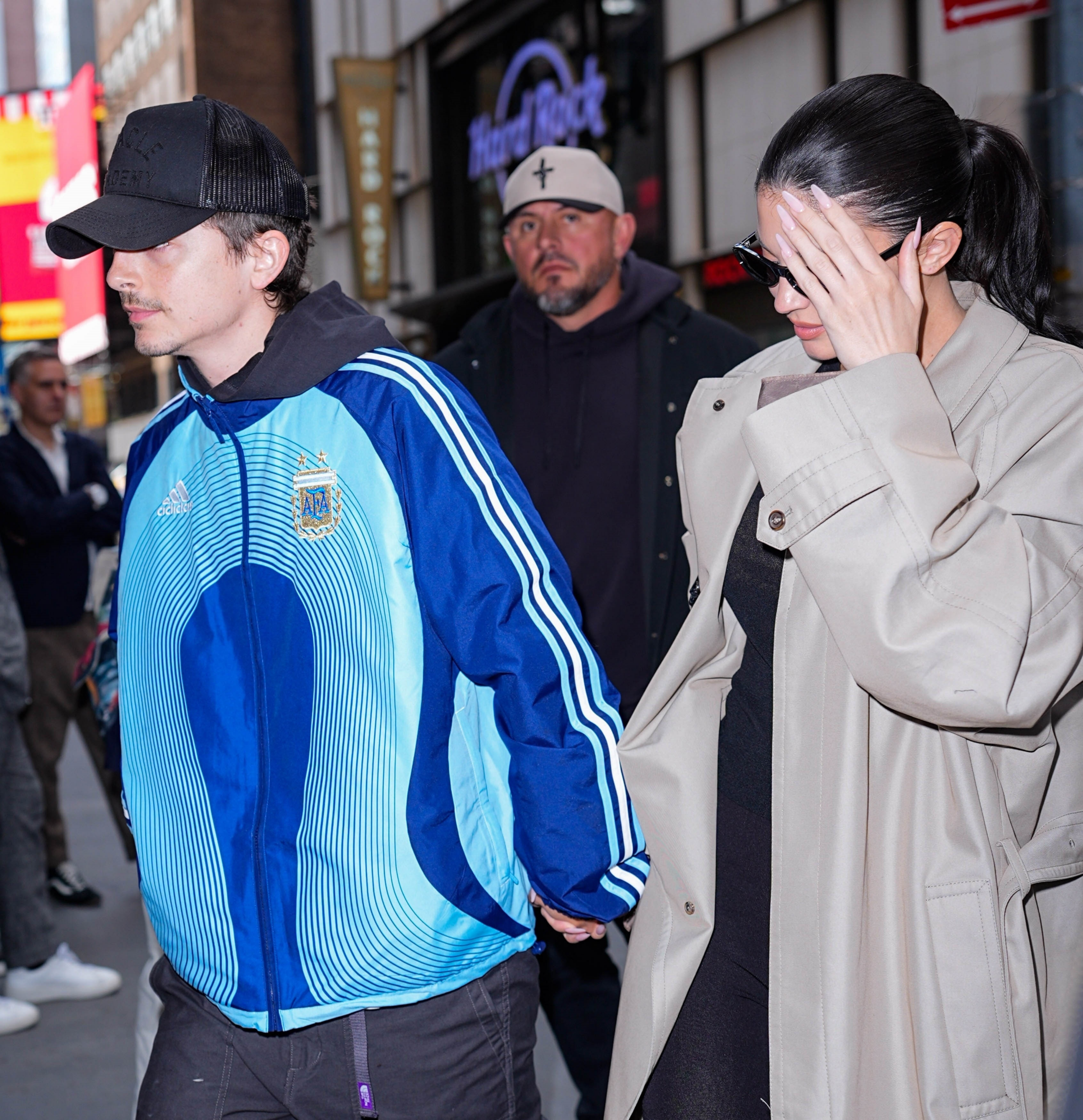 Kylie Jenner and Timothee Chalamet holding hands as they leave a Broadway show.