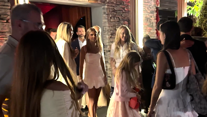 Family and guests gather during Kai Trump's graduation celebration in Palm Beach Gardens.