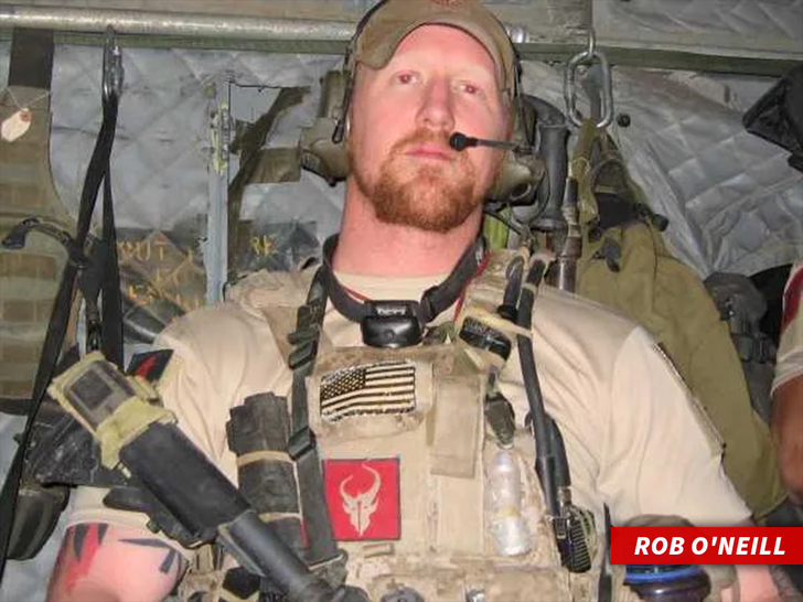 Rob O'Neill presents the glove he says he wore during the 2011 raid that killed Osama bin Laden.