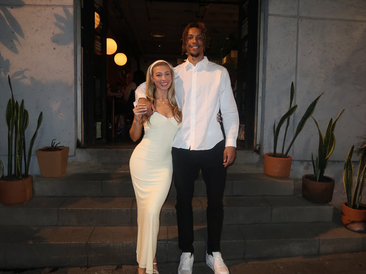 Brandon Clarke and Amber Lorraine posing together during happier times