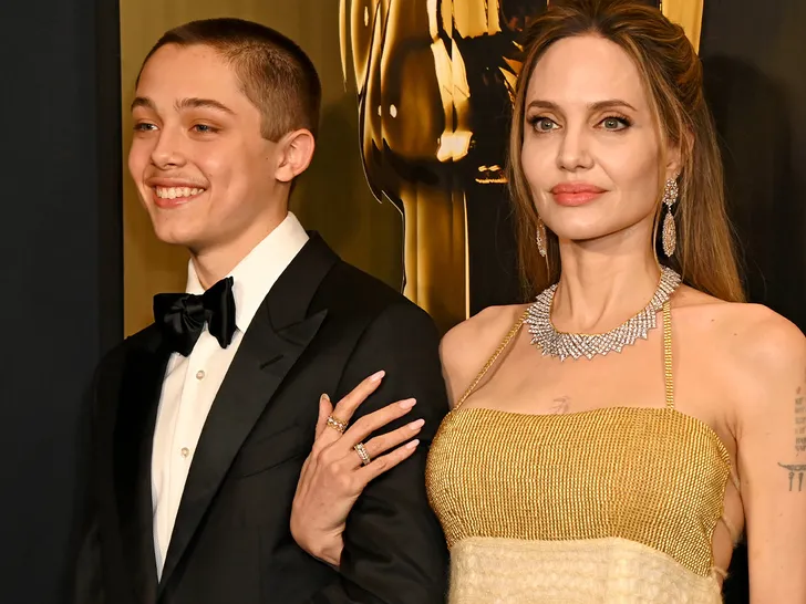 Knox Jolie-Pitt on a past red carpet, before his new orange hair