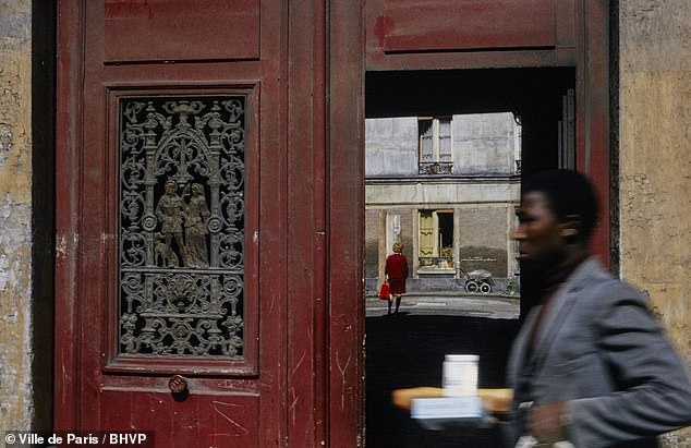 Hidden Renaissance courtyard glimpsed through a grand doorway