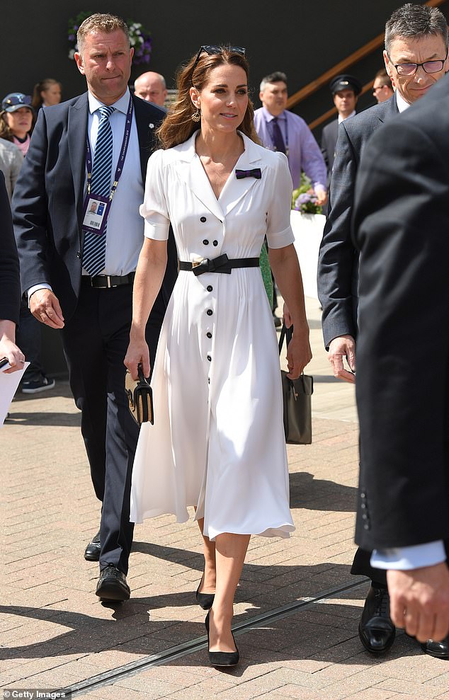 Catherine, Princess of Wales, wearing a crisp white Melissa Odabash design