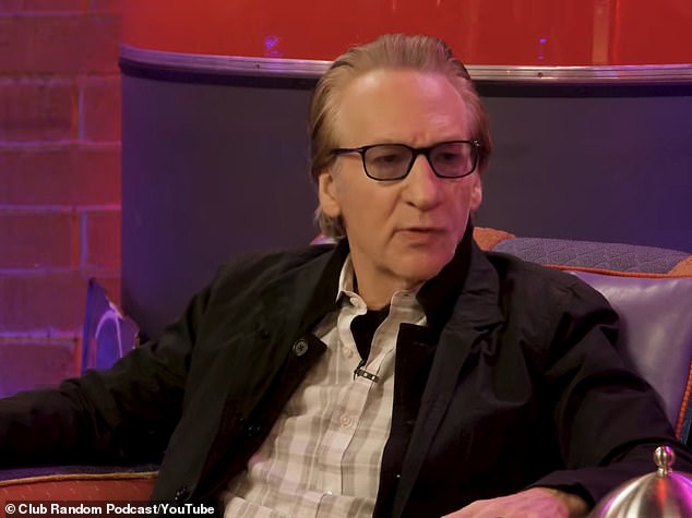Bill Maher seated during an interview