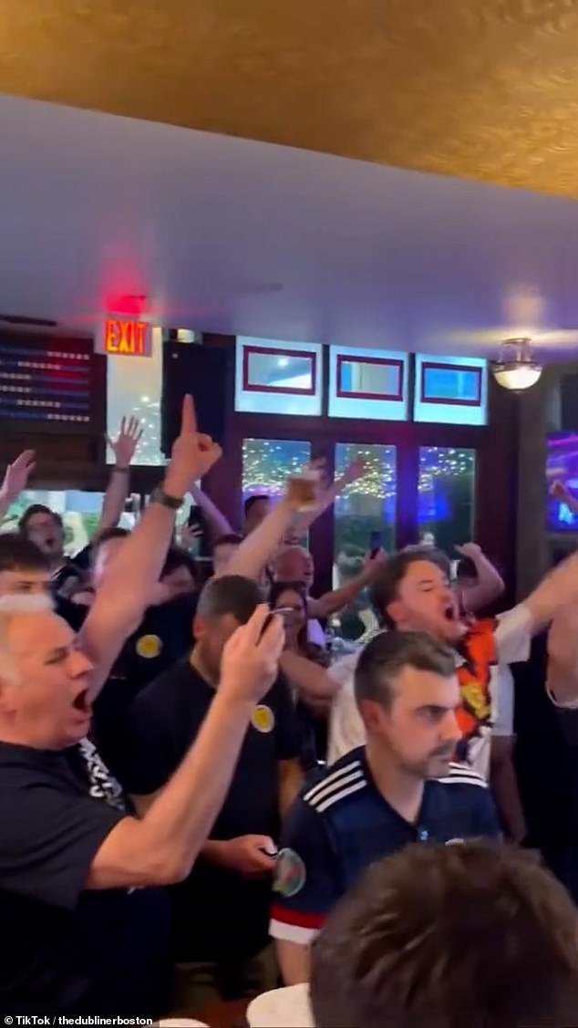 Scotland fans pack a Boston pub, singing at full voice and wowing U.S. observers