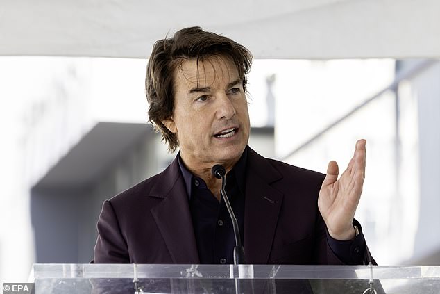 Tom Cruise delivers David Beckham's induction speech at the Hollywood Walk of Fame ceremony