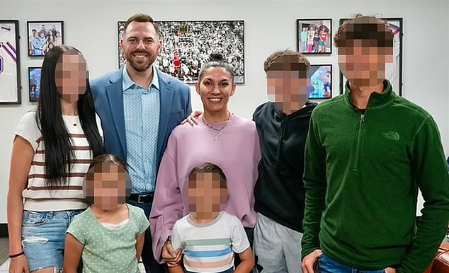 Jackson Lahmeyer with his wife Kendra and their five children