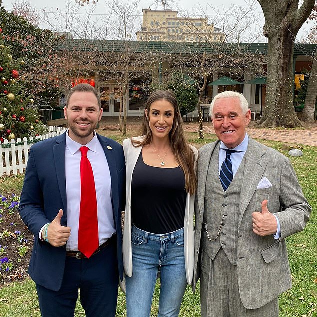 Jackson Lahmeyer and Caitlin Simmons Key posing with Republican operative Roger Stone