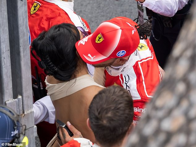 Lewis Hamilton kisses Kim Kardashian on the cheek after finishing second at the Monaco Grand Prix.