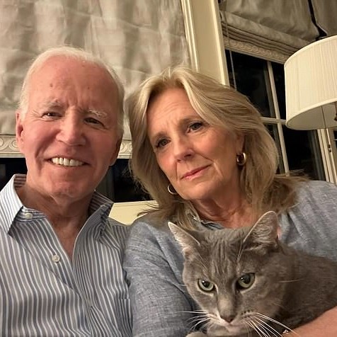 A photo shared of former President Joe Biden (left) and former First Lady Jill Biden (right) and their cat Willow on the heels of making the former President's cancer diagnosis public last May - Daily Mail