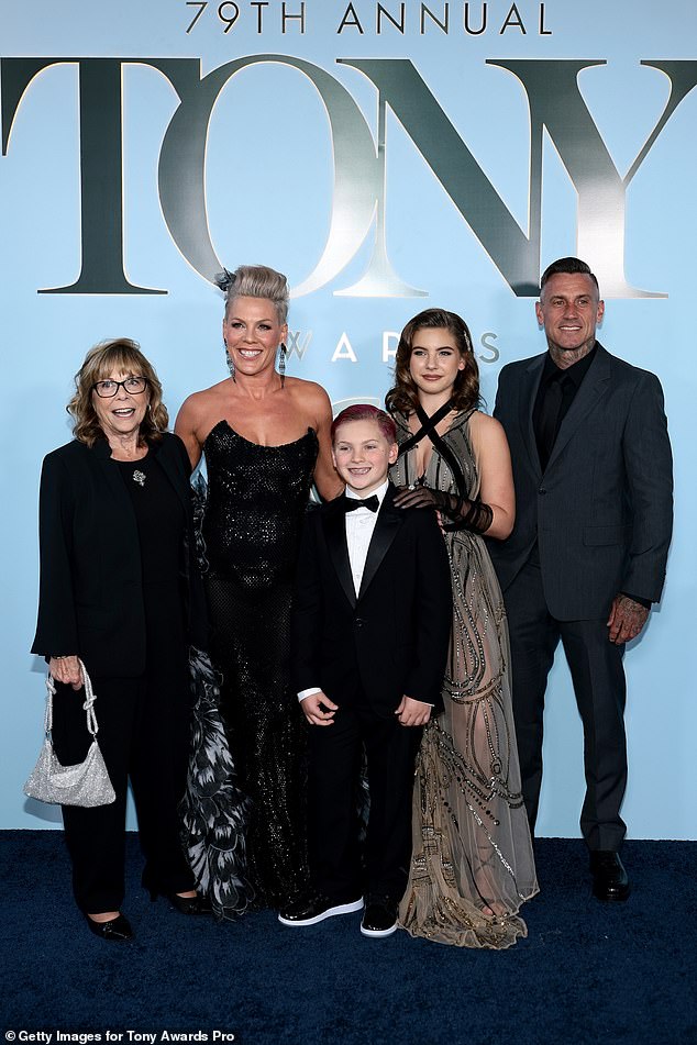 Pink poses on the Tony Awards red carpet with her mom Judith Moore, daughter Willow, son Jameson, and husband Carey Hart.