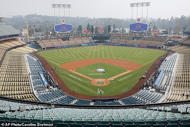Dodger Stadium shrouded in haze from a nearby warehouse fire