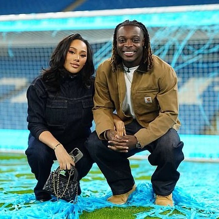 Doku has come under fire for saying that he intends to leave the World Cup to attend the birth of his first child (Doku pictured with wife Shireen) - Daily Mail