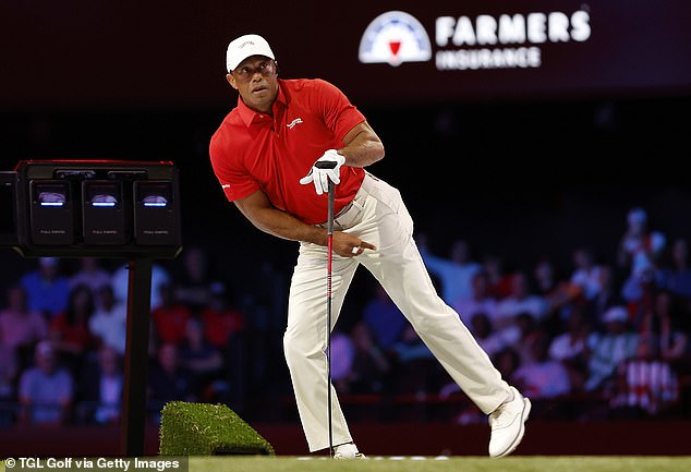 Tiger Woods on course during play amid reports he will complete treatment in Europe by month's end