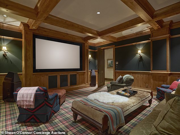 Private home cinema with oversized seating at Elk Mountain Lodge