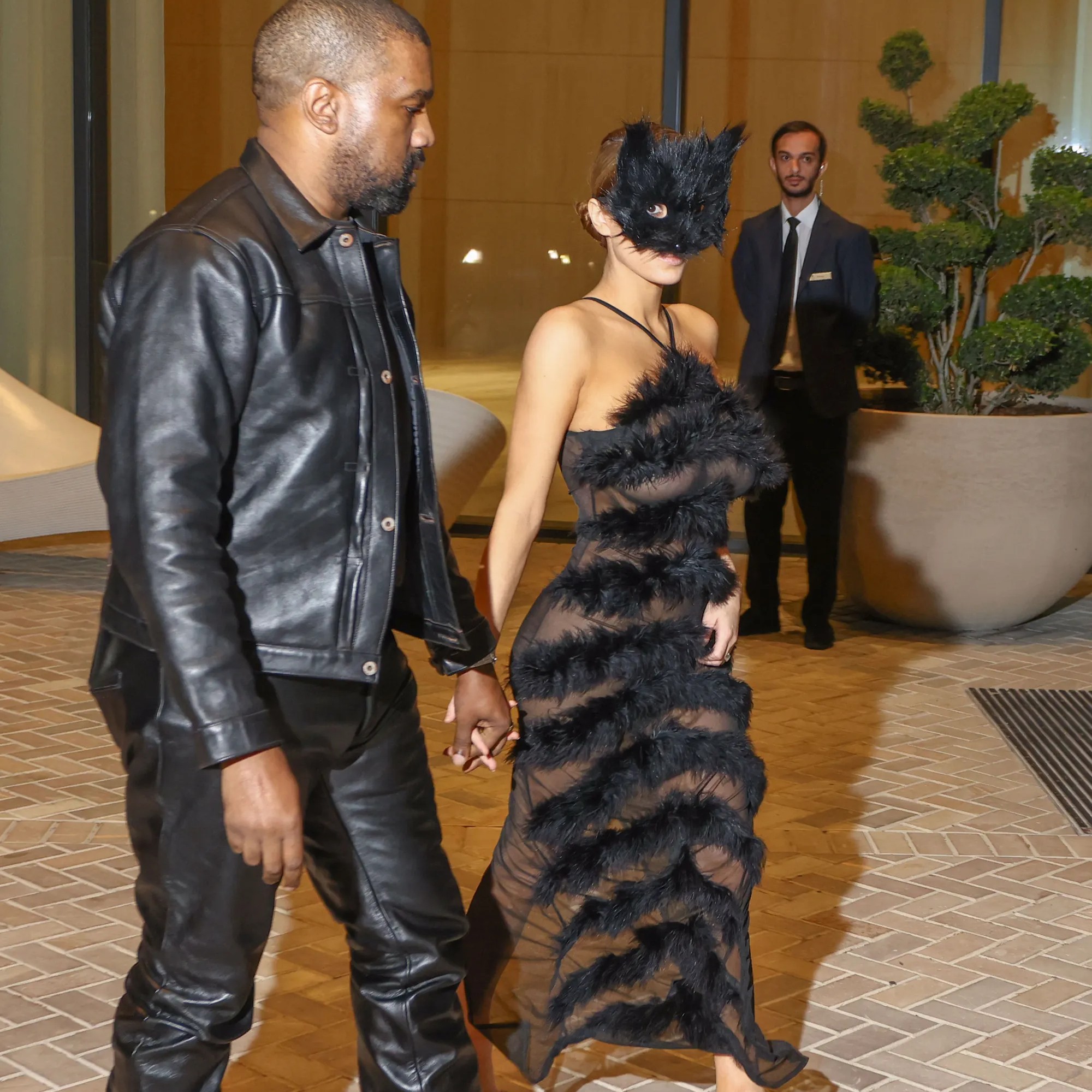 Bianca Censori stepped out in a cat mask and sheer dress to Cafe Stamba in Tbilisi, Georgia, on Saturday night. LS - LS